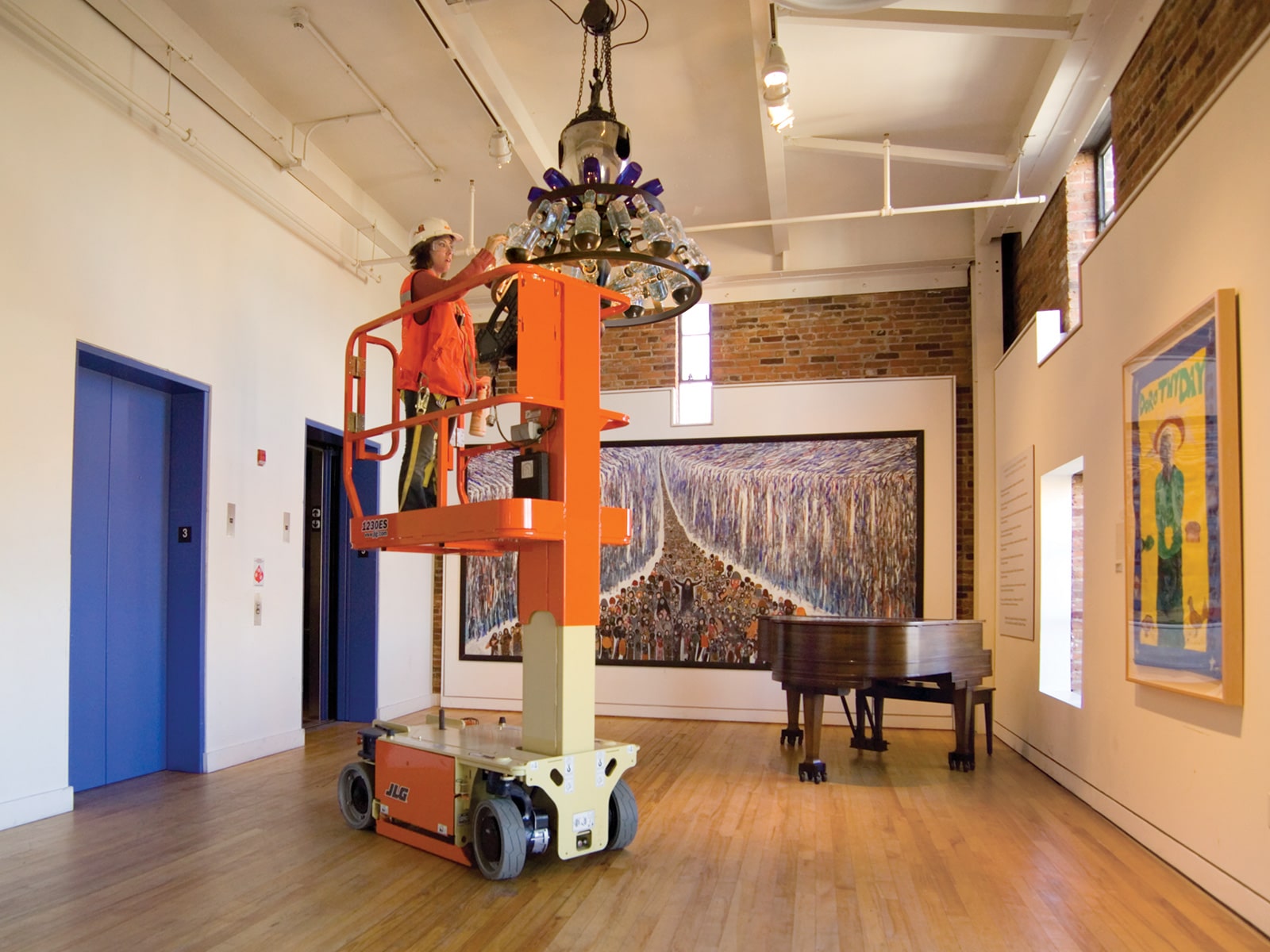 jlg 1230es driveable vertical mast lift cleaning application