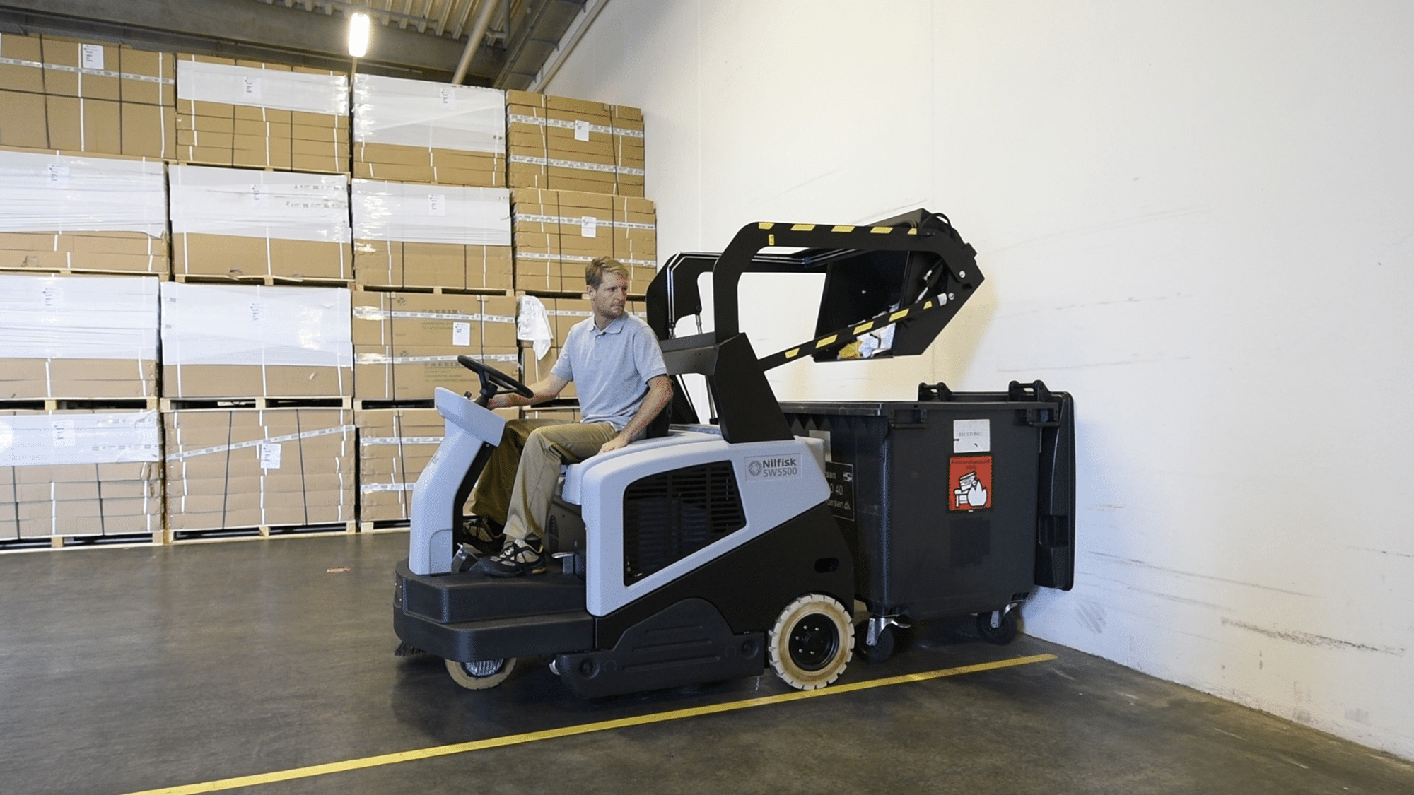 nilfisk sw5500 rider sweeper warehouse application