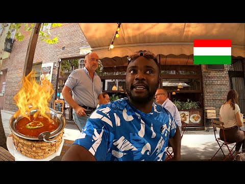 Trying Traditional Spicy Goulash Soup In Budapest